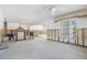 Large living room with bright windows, offering a blank canvas for renovation and personalization at 120 Carlyle Cir, Palm Harbor, FL 34683