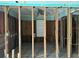 Room framed with studs, electrical wiring, and a window at 19109 Gulf Blvd, Indian Shores, FL 33785