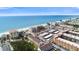Stunning aerial view of condo complex, beach, and surrounding community near the coast at 19651 Gulf Blvd # A6, Indian Shores, FL 33785