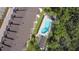 Aerial view showcasing the community pool and the surrounding lush landscaping at 19651 Gulf Blvd # A6, Indian Shores, FL 33785