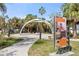 Community park featuring historical markers, lush landscaping, and walkways at 19651 Gulf Blvd # A6, Indian Shores, FL 33785
