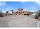 Exterior view of commercial building and adjacent parking lot with palm tree landscaping at 19651 Gulf Blvd # A6, Indian Shores, FL 33785