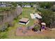 Community park featuring a playground, basketball court, covered picnic area, and green spaces at 2009 Sheffield Ct, Oldsmar, FL 34677