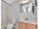 Traditional bathroom with a standard tub, toilet, and vanity at 2009 Sheffield Ct, Oldsmar, FL 34677