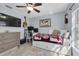 Cozy bedroom with daybed, desk and TV, perfect for relaxing or studying at 2009 Sheffield Ct, Oldsmar, FL 34677