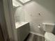 Updated bathroom with a modern vanity, framed mirror, and a toilet at 2131 Ridge S Rd # 86, Largo, FL 33778
