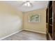 Bedroom featuring neutral walls, wood floors, ceiling fan, and a closet at 22002 Darley Pl, Land O Lakes, FL 34639