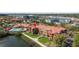 Gorgeous condominiums with a community pool surrounded by manicured landscaping and beautiful lake views at 2709 Via Cipriani # 532B, Clearwater, FL 33764