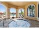 Relaxing hot tub inside the clubhouse overlooks pool and gym offering a luxurious spa-like experience for residents at 2709 Via Cipriani # 532B, Clearwater, FL 33764