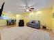 Bright living room with lots of light and a ceiling fan at 3001 58Th S Ave # 912, St Petersburg, FL 33712