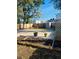 Exterior backyard with a garden plot, tree, storage shed and concrete at 4108 55Th N Ave, St Petersburg, FL 33714