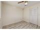 Cozy bedroom features wood-look flooring and a built-in closet at 4715 Bay Ne St # 323, St Petersburg, FL 33703