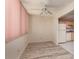 Bright dining area with hardwood floors and a ceiling fan conveniently near the kitchen at 4715 Bay Ne St # 323, St Petersburg, FL 33703
