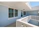 Exterior view of front door and window detail on walkway at Winston Park Northeast at 4715 Bay Ne St # 323, St Petersburg, FL 33703