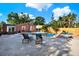 Backyard with a custom pool and patio seating, perfect for entertaining at 5613 19Th S Ave, Gulfport, FL 33707