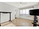 Bright bedroom with tile flooring, large windows, and plenty of natural light, creating a serene atmosphere at 5613 19Th S Ave, Gulfport, FL 33707