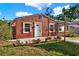 Charming single-story home with colorful landscaping and a quaint, inviting facade on a sunny day at 5613 19Th S Ave, Gulfport, FL 33707
