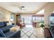 Open-concept living area with a clear view into the kitchen and outdoor patio at 736 Flamingo Dr, Apollo Beach, FL 33572