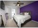 Bedroom featuring a plush bed and light-filled window at 895 Sea Holly Dr, Brooksville, FL 34604