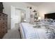 Comfortable bedroom offers carpet flooring, natural light, and closet space for a peaceful retreat at 895 Sea Holly Dr, Brooksville, FL 34604