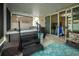 Enclosed patio with a hot tub and sliding glass door at 895 Sea Holly Dr, Brooksville, FL 34604