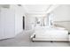 Bright bedroom with gray carpet at 9119 Forge Breeze Loop, Wesley Chapel, FL 33545