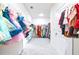 Spacious walk-in closet with ample storage for clothing and accessories at 9119 Forge Breeze Loop, Wesley Chapel, FL 33545