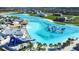 Experience the ultimate waterpark amenities with slides and water activities in this expansive community pool and recreation area at 9119 Forge Breeze Loop, Wesley Chapel, FL 33545