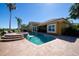 Enjoy outdoor living with a sparkling pool, spa and lush landscaping with a glimpse of the surrounding area at 9515 Silverthorn Rd, Seminole, FL 33777