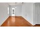 Empty dining room with wood floors, and neutral walls at 11718 N Ola Ave, Tampa, FL 33612