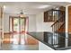 Bright living room featuring hardwood floors and glass patio doors at 130 80Th Ne Ave, St Petersburg, FL 33702