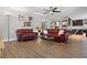 Spacious living area showcasing hardwood floors and elegant furnishings and decor at 1426 75Th Ne Cir, St Petersburg, FL 33702