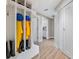 Organized mudroom featuring storage cubbies, hooks, and durable flooring, perfect for entry at 1426 75Th Ne Cir, St Petersburg, FL 33702