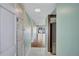 Inviting entryway featuring tile flooring that transitions to wood with an open view of the living area at 19029 Us Highway 19 N # 1-22, Clearwater, FL 33764