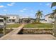Backyard featuring a private dock and screen enclosed porch perfect for relaxing outdoors at 1936 Arrowhead Ne Dr, St Petersburg, FL 33703