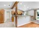 Kitchen with granite countertops, stainless steel appliances, and a breakfast bar at 19531 Deer Lake Rd, Lutz, FL 33548