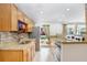 Updated kitchen boasts stainless appliances, granite counters, and ample cabinet space at 19531 Deer Lake Rd, Lutz, FL 33548