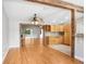 Spacious living space with hardwood floors, wooden beams, and an open concept at 19531 Deer Lake Rd, Lutz, FL 33548