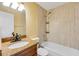 Bathroom features granite vanity, tiled shower and a tub at 2412 Giddens Ave, Seffner, FL 33584