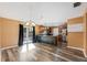 Open kitchen with modern appliances, granite counters, and a breakfast bar at 2412 Giddens Ave, Seffner, FL 33584