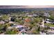 Aerial view highlighting the property's location within a tranquil, tree-filled residential area at 2887 North Rd, Clearwater, FL 33760