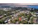 Aerial shot highlights the property's proximity to waterfront views and recreational facilities like baseball fields at 2887 North Rd, Clearwater, FL 33760