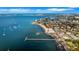 Breathtaking aerial view of coastal waterfront with city views, clear waters and a sandy beach at 3026 51St S St, Gulfport, FL 33707