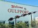 Charming welcome sign to Gulfport, featuring a unique bird sculpture, adding character to the community at 3026 51St S St, Gulfport, FL 33707