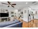 Spacious living room featuring modern finishes and open layout with adjacent kitchen at 3026 51St S St, Gulfport, FL 33707