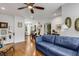 Spacious living room featuring hardwood floors, stylish decor, with access to the dining room at 3026 51St S St, Gulfport, FL 33707