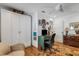 Bright office space with built-in storage, wicker desk, and stylish chair at 3026 51St S St, Gulfport, FL 33707