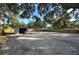 Large backyard with a utility shed and fenced perimeter at 3515 18Th E St, Bradenton, FL 34208