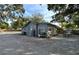 Cozy single-story home featuring a spacious yard perfect for outdoor seating and entertaining guests at 3515 18Th E St, Bradenton, FL 34208
