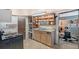 Kitchen features built-in cabinets and a view into the living area at 3515 18Th E St, Bradenton, FL 34208